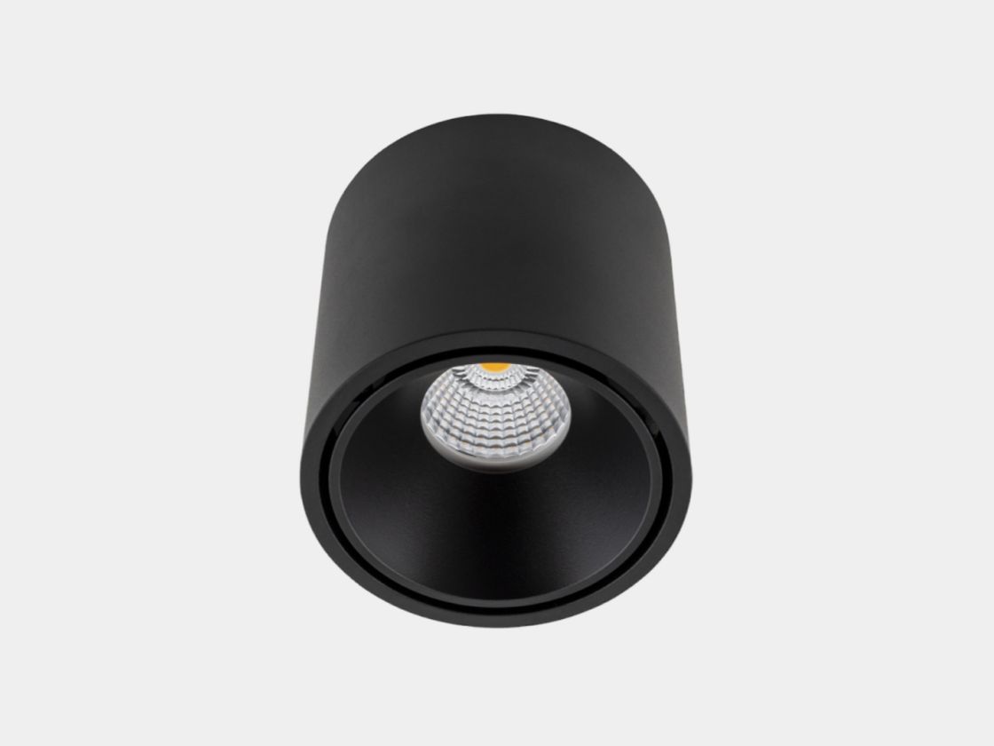 Черный цилиндрический накладной светильник, ракурс снизу сбоку