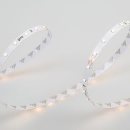 Светодиодная лента тёплого свечения на белой подложке