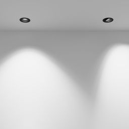 Два встраиваемых черных спота на потолке, световые пятна
