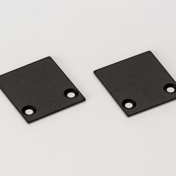 Две черные алюминиевые заглушки, вид сверху