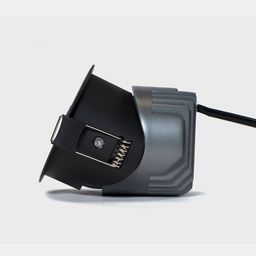 Боковой вид светильника с поворотным узлом и пружиной