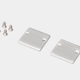 Две серебристые заглушки LS.2020 с крепёжными винтами