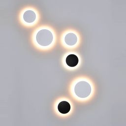 Настенные круглые светильники с кольцевой подсветкой на стене