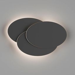 Настенный светильник черный, включен, мягкая подсветка стены