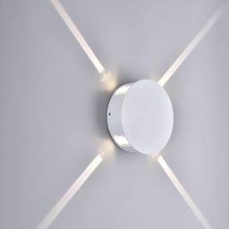 Светильник на стене, диагональные лучи вверх вниз