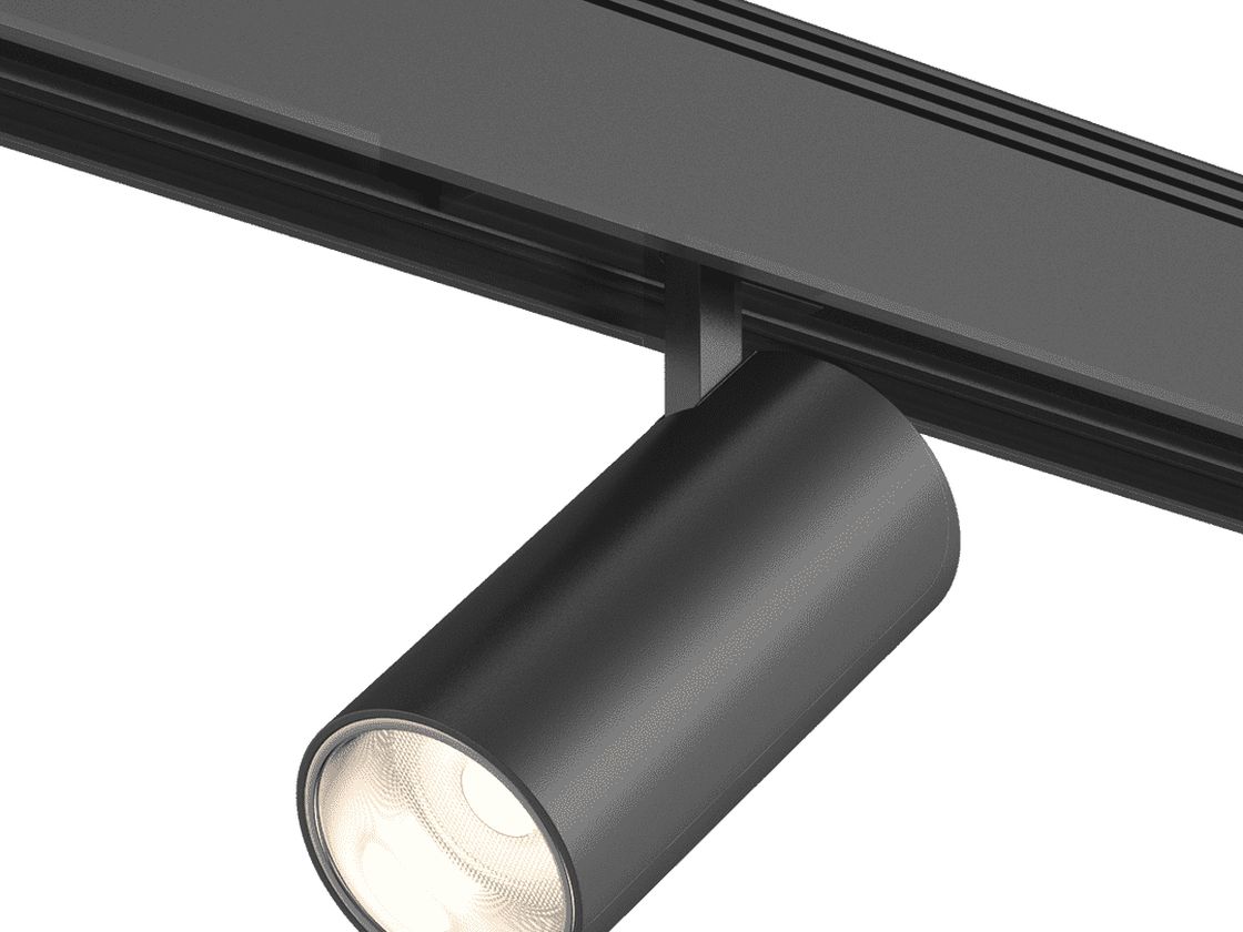Черный трековый светильник цилиндрический на шинопроводе, включен