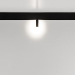 Черный спот на треке, свет направлен вправо