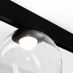 Крупный план светильника-шара у магнитного трека