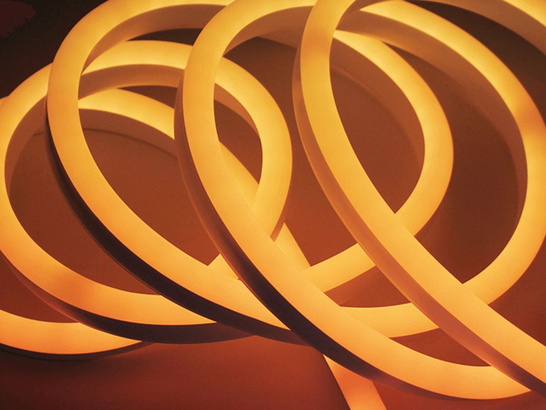 Гибкий неон оранжевого цвета, крупный план витков