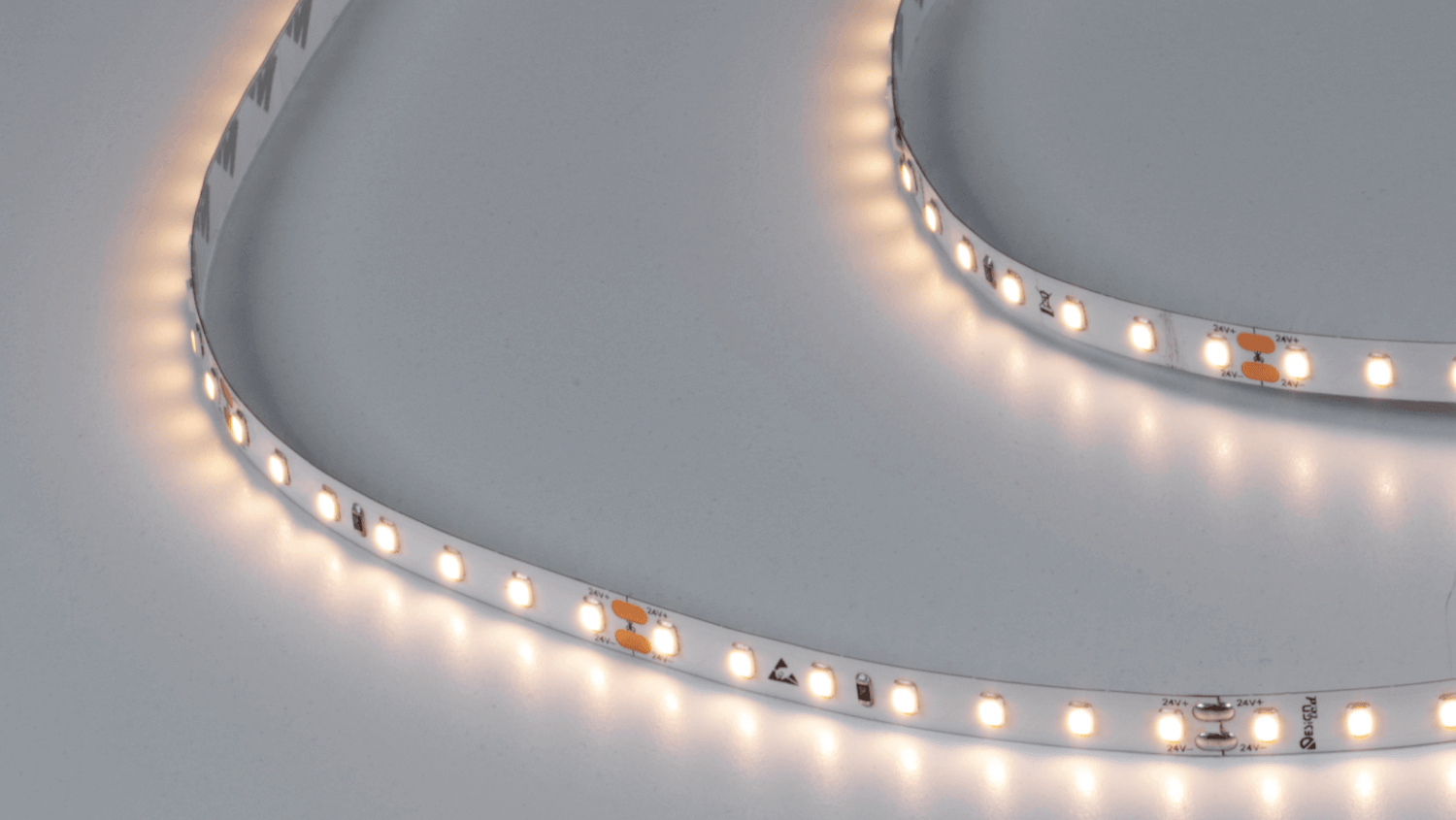 Светодиодная лента LUX, 2835, 98 LED/м, 10 Вт/м, 24В, IP33, Теплый белый (3000K) DesignLed DSG298-24-WW3-33 DSG298-24-WW3-33