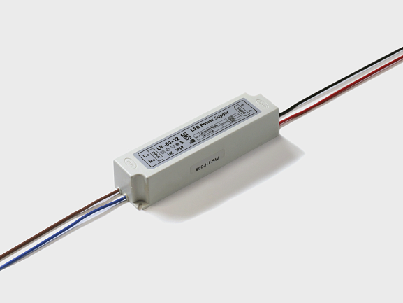 Фото Блок питания для светодиодных лент IP 67 пластик 60 W, 12V, LV-60-12 от магазина SWGShop.ru